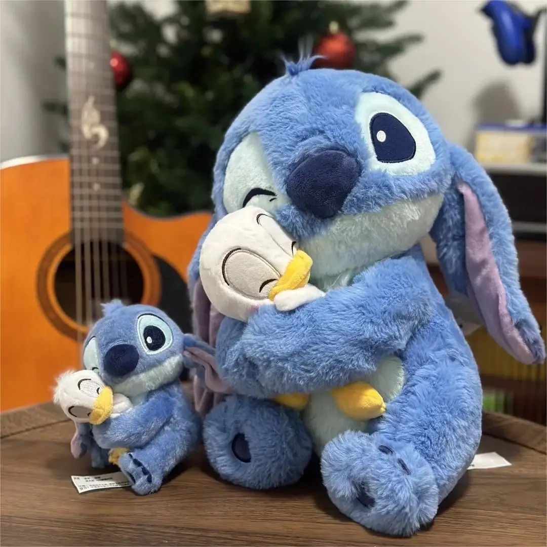 Stitch holding a duck plush toy