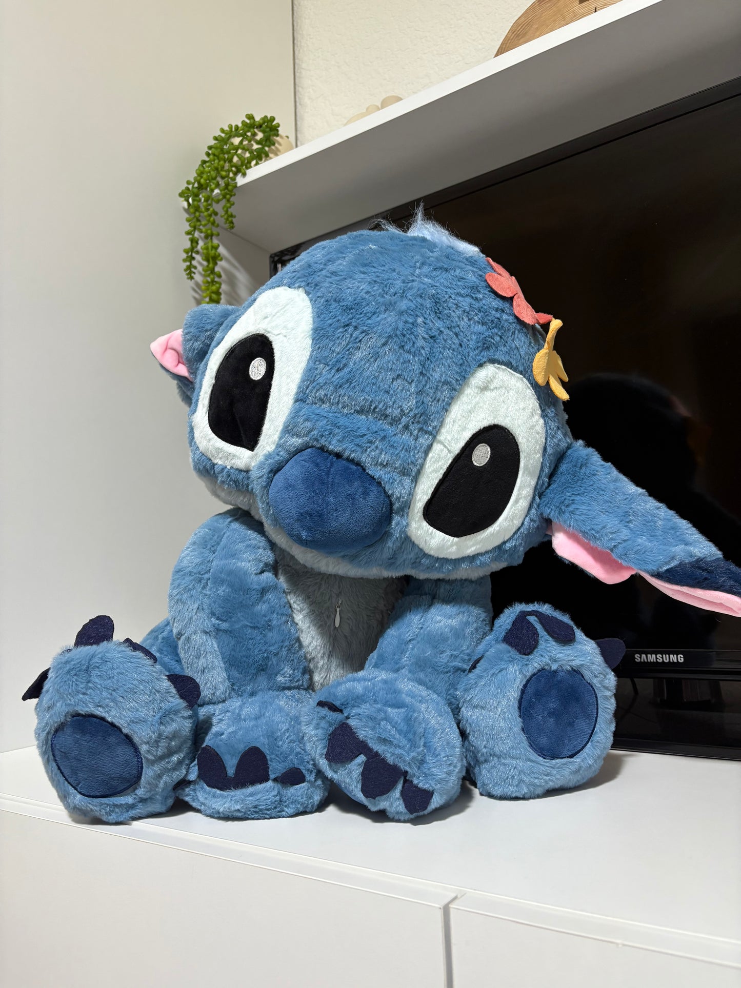 Stitch with flowers on his head plush toy