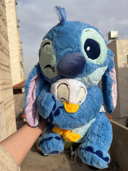 Stitch holding a duck plush toy (40 cm )