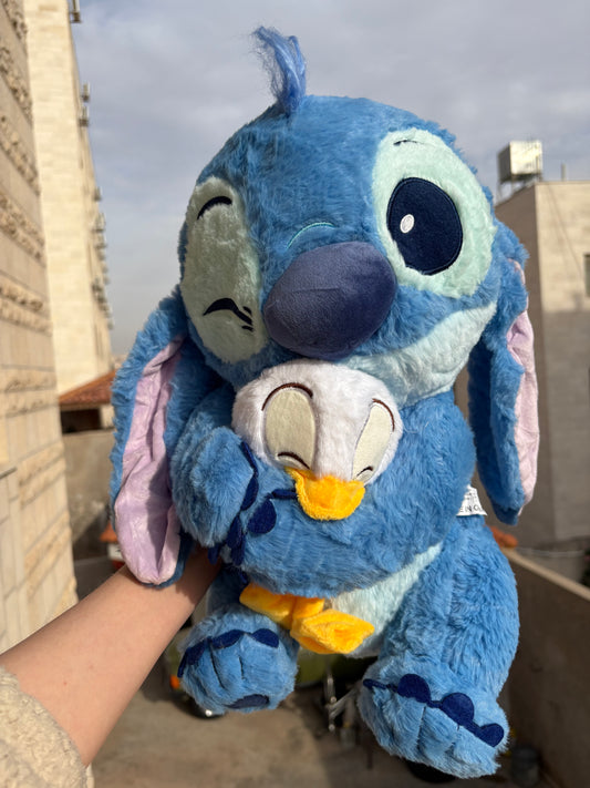 Stitch holding a duck plush toy (40 cm )
