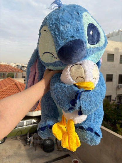 Stitch holding a duck plush toy (55 cm )