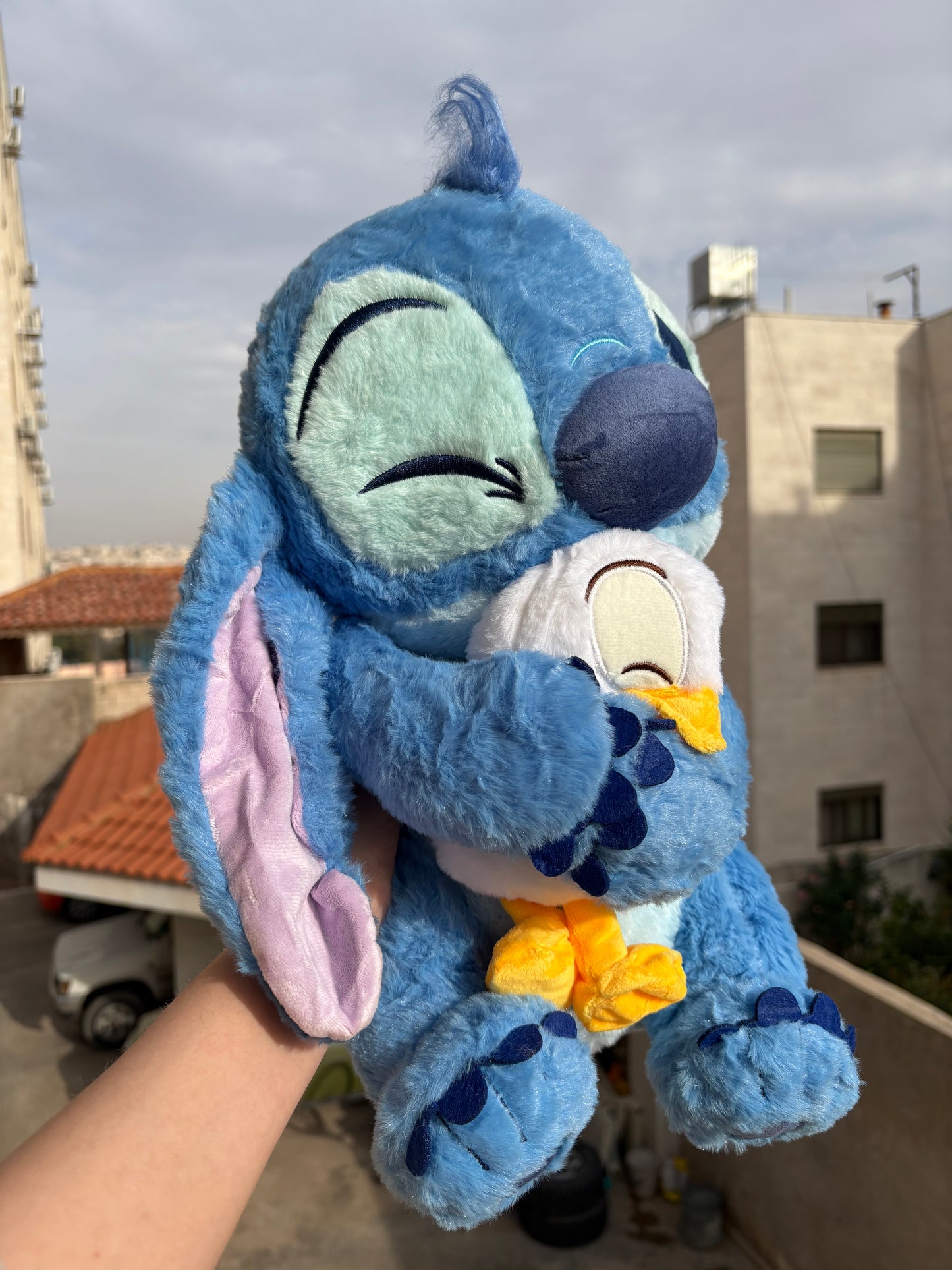 Stitch holding a duck plush toy (40 cm )