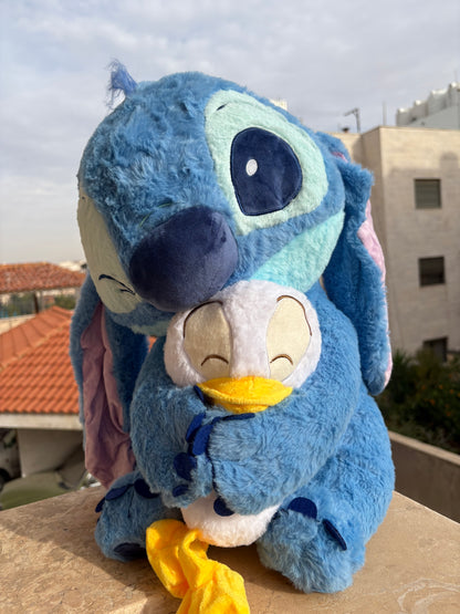 Stitch holding a duck plush toy (55 cm )