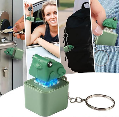 Green dog-shaped keychain holder with keychain attached, shown in various contexts.