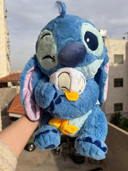 Stitch holding a duck plush toy (40 cm )