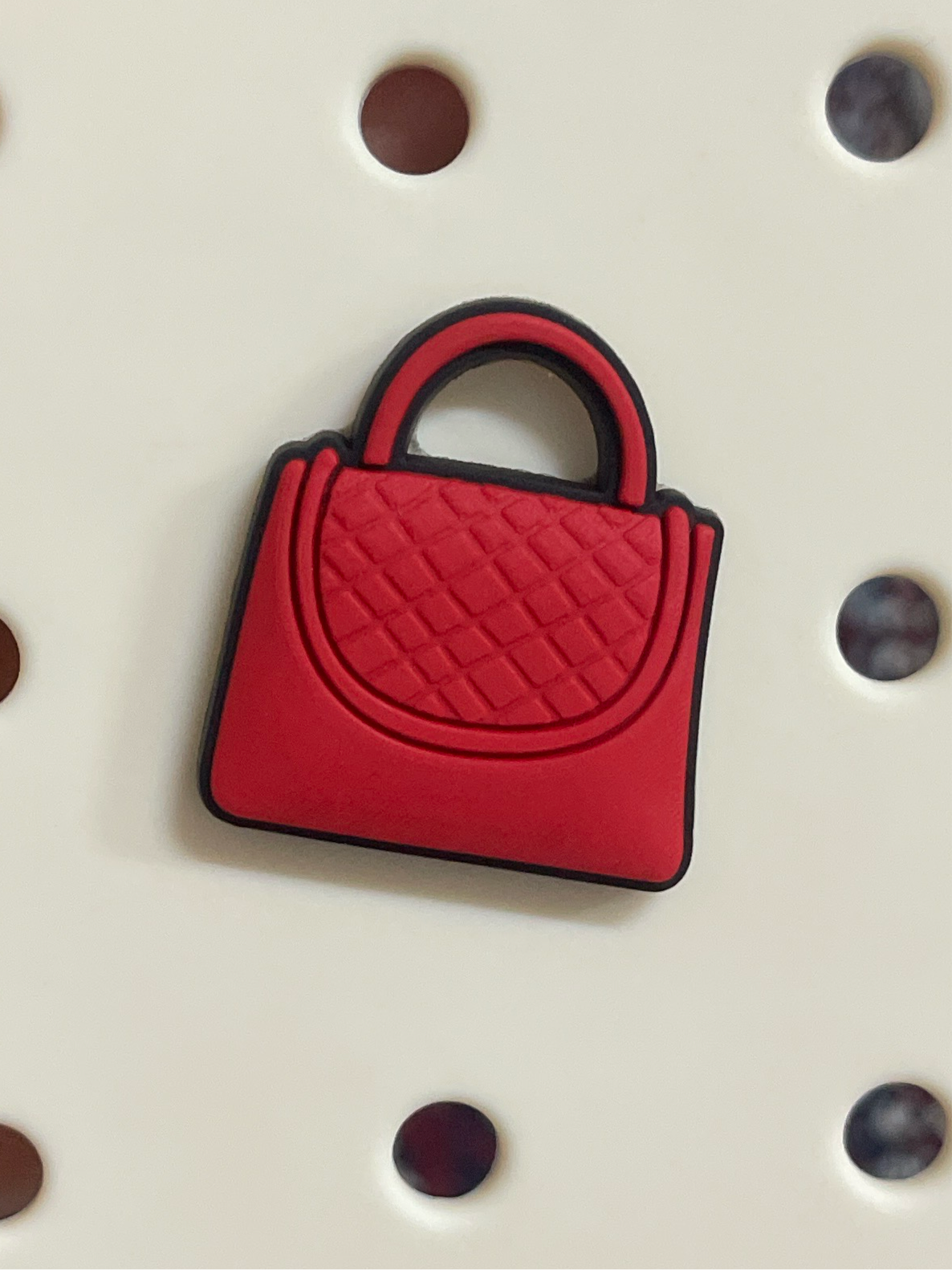 Red bag charm