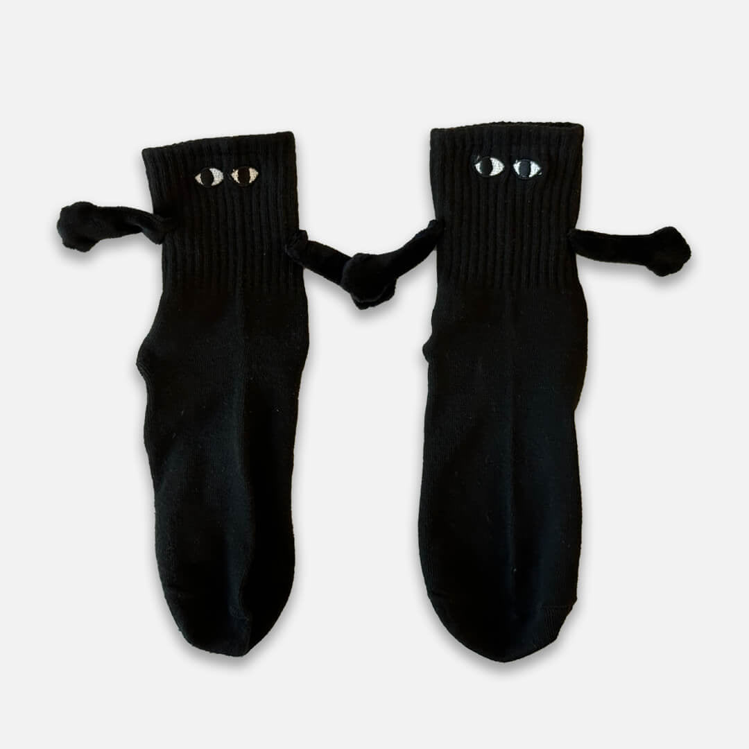 Holding hands black socks