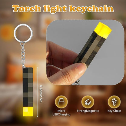 A pixelated torch light keychain shown on a blurred indoor background, with a hand holding one version, a side dimension label, and feature icons for micro USB charging, strong magnetism, and key chain use.